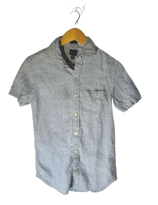 Light blue short-sleeved button-up shirt on a hanger.