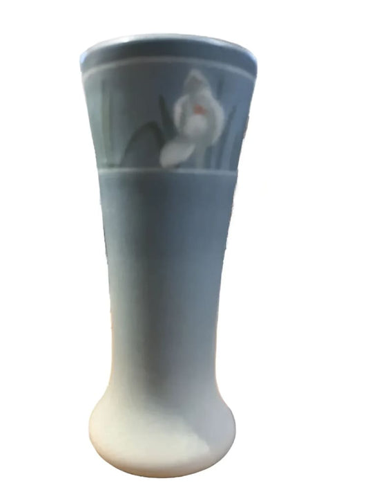 Floral-decorated, light blue vase.